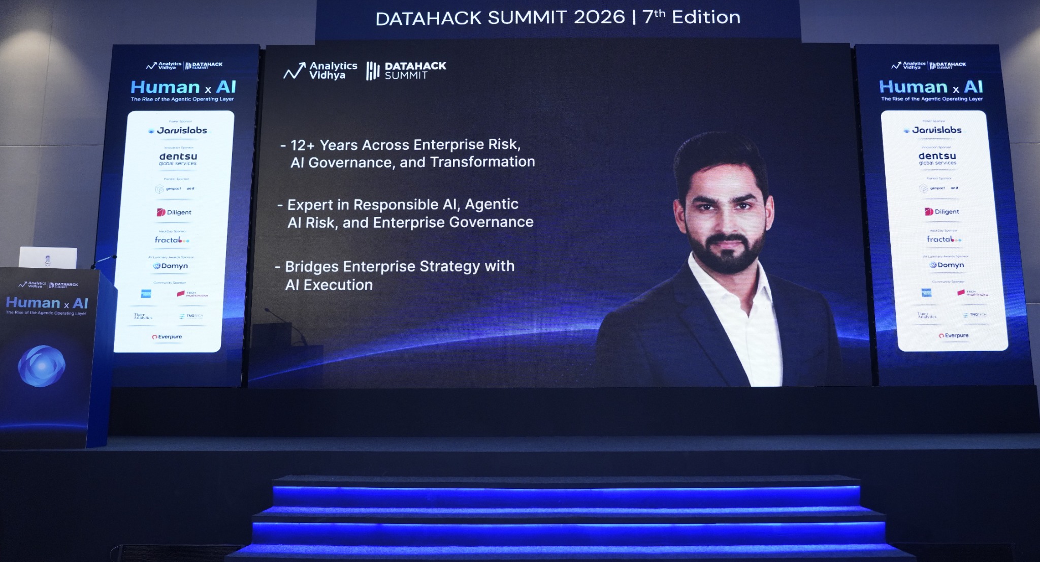 DataHack Summit 2026 stage display introducing Kunal Deore with his speaker biography and portrait.